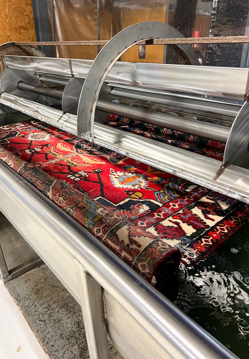 Immersion washing the Persian rug
