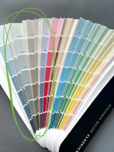 Benjamin Moore fan deck of classic colors with muddy interior paint colors circled