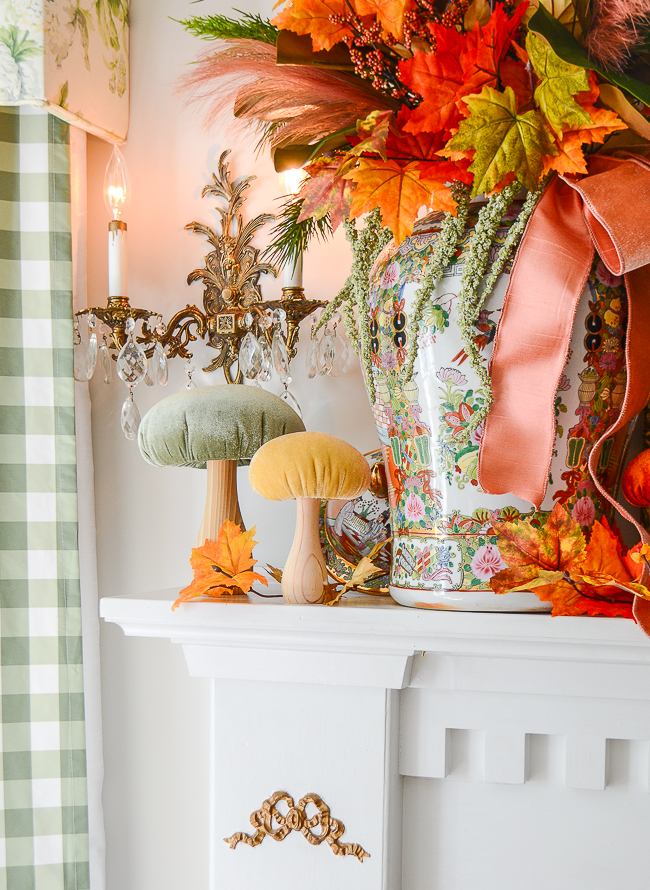 Velvet mushrooms decorate this autumn mantel for a dose of whimsy