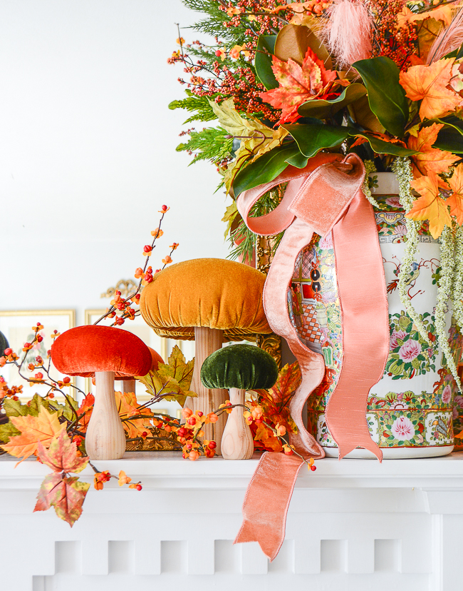 Velvet mushrooms decorate this autumn mantel