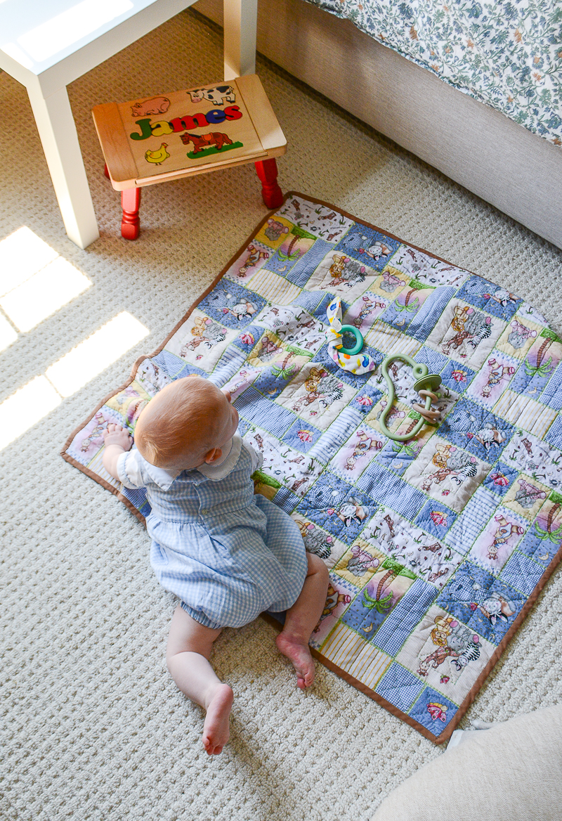 James' playing in his green woodland themed nursery