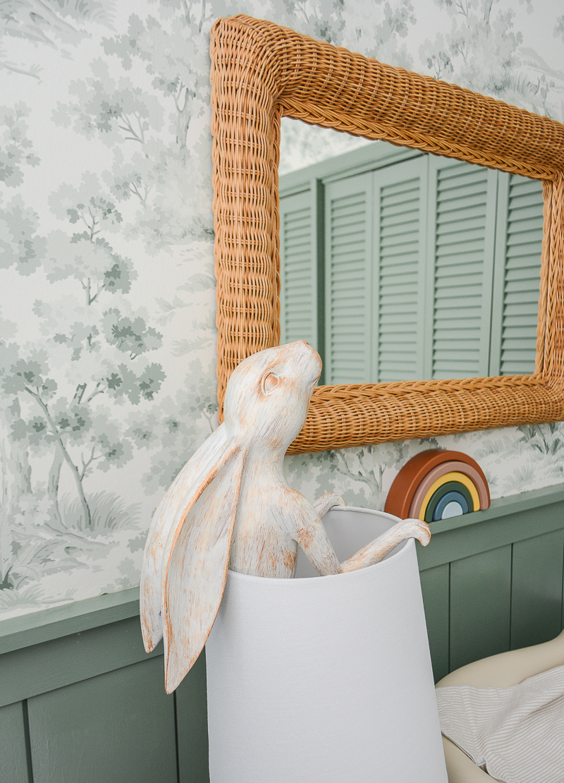 Bunny lamp and vintage wicker mirror in boy's nursery