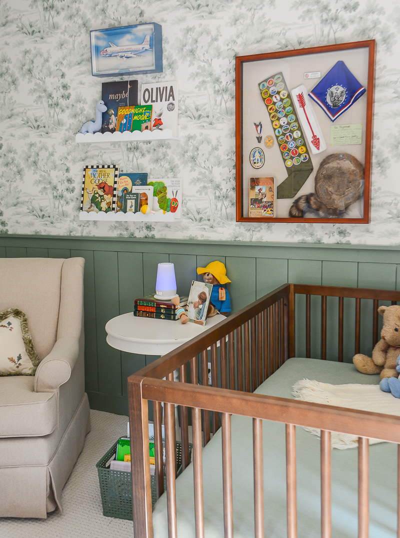 sage green boy's nursery with vintage decor