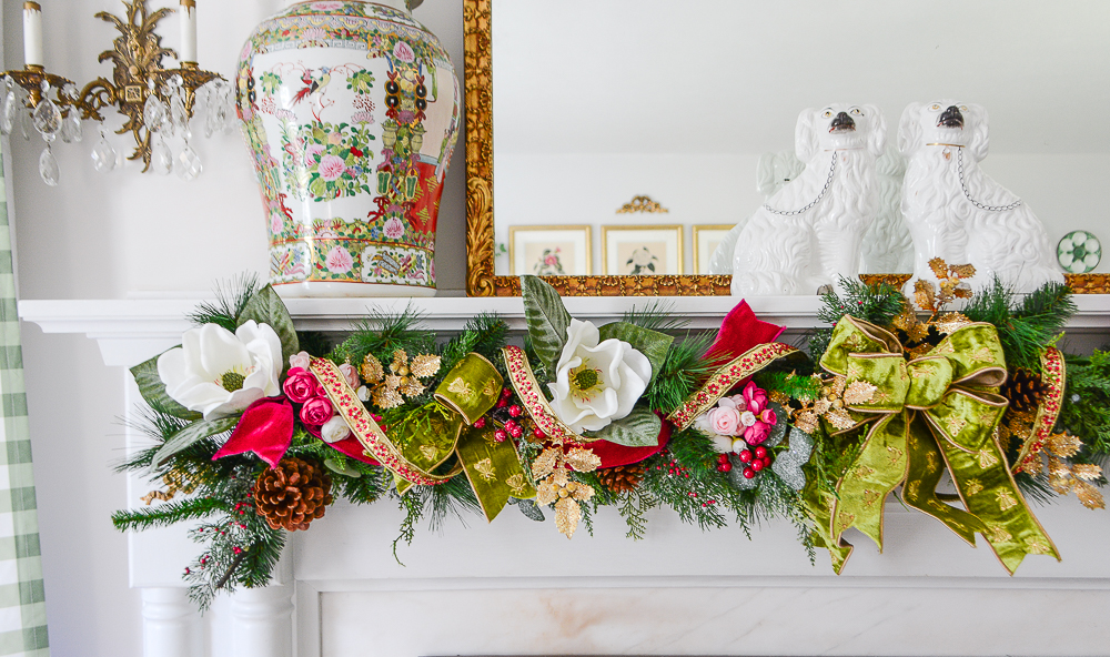 Jolly Blossoms Christmas Garland Kit look with pink and green ribbon, magnolia, red berries, and gold holly