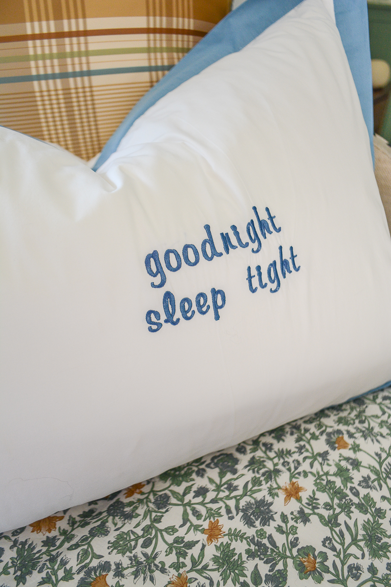 Goodnight sleep tight embroidered pillow for a dose of whimsy in woodland nursery design