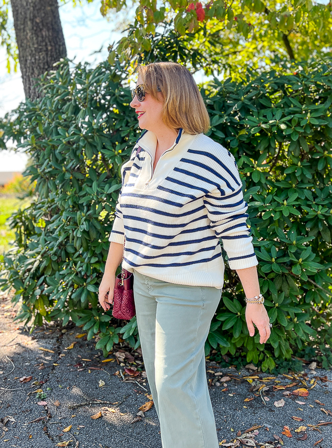 Katherine in striped zip collar sweater and green wide leg pants - shop your closet for fall trends