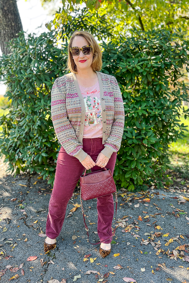 Katherine in garnet hued cords, fair isle cardigan, and pink Emma tee