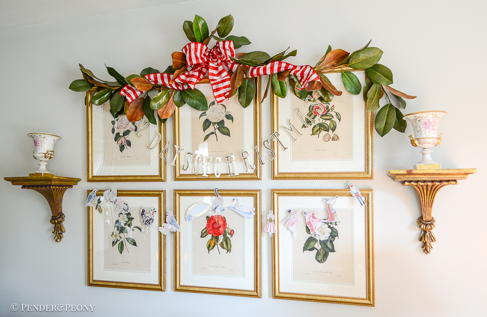 "12 days of Christmas" banner hung on Katherine's botanical gallery wall