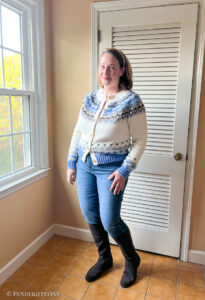 Katherine wearing NYDJ Sherri slim leg jeans and LandsEnd fair isle sweater with brown suede boots