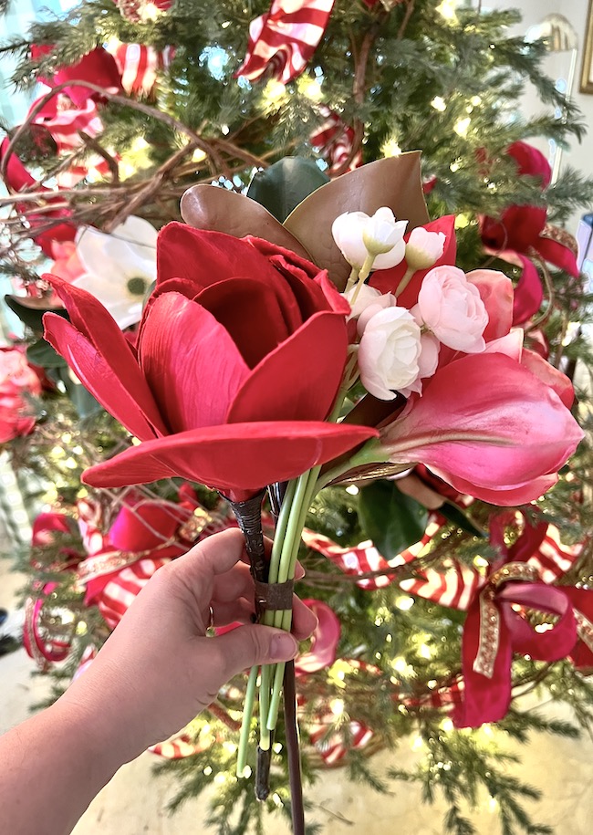 Floral bouquet picks with red velvet magnolia, pink amaryllis, and ranunculus