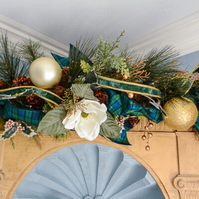 Gingerbread forest swag hung on top of hutch shelving