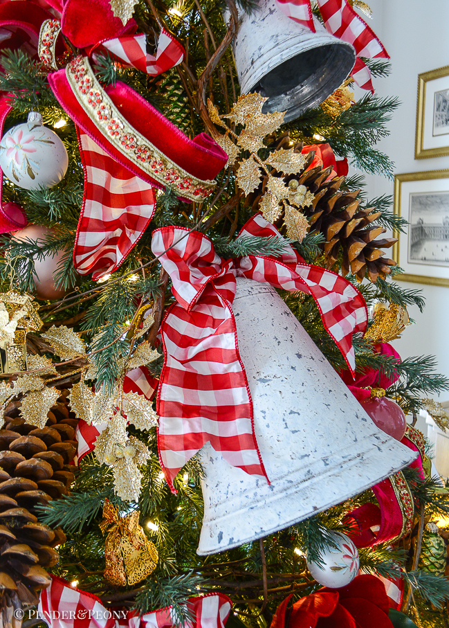 Detail view of the Jolly Blossoms tree - floral Christmas tree with white bells and gingham bows