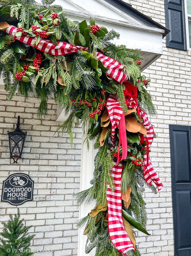 A detail view of my fresh sculptural Christmas garland at the front door