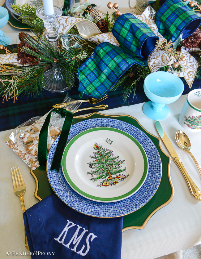 Spode Christmas tree china stacked on Mottahedeh blue lace for a classic Christmas place setting
