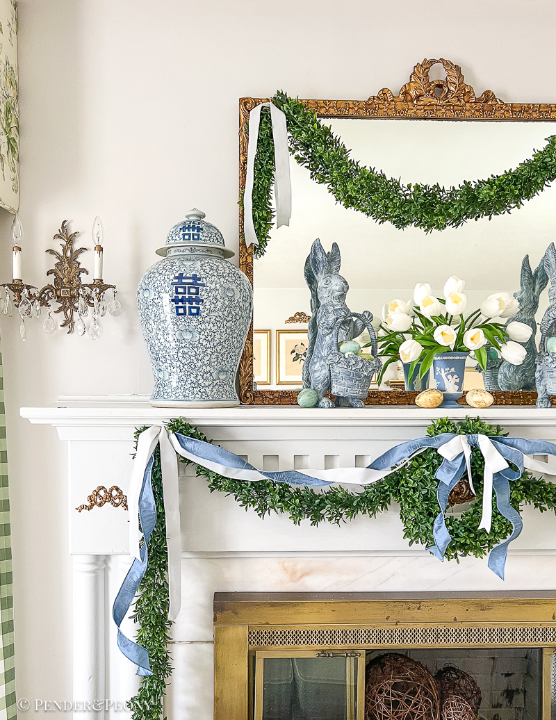 Boxwood and bunnies blue and white Easter mantel with Regency inspired decor