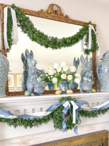 Boxwood and bunnies blue and white Easter mantel with Regency inspired decor