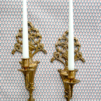 Charming bow candle sconces to add interest to your wall.
