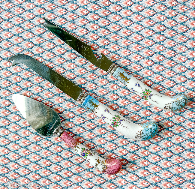 Beautiful floral porcelain handled cheese knives. Sheffield, Stainless.