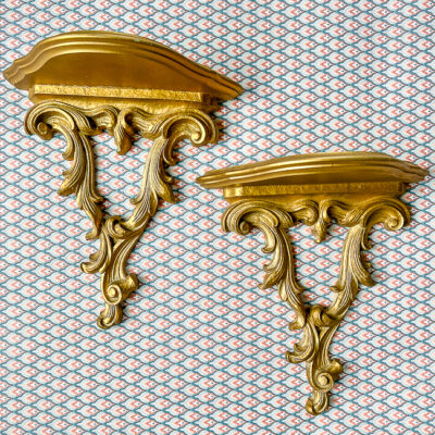 Gorgeous gold wall shelves to display a treasured trinket or two.