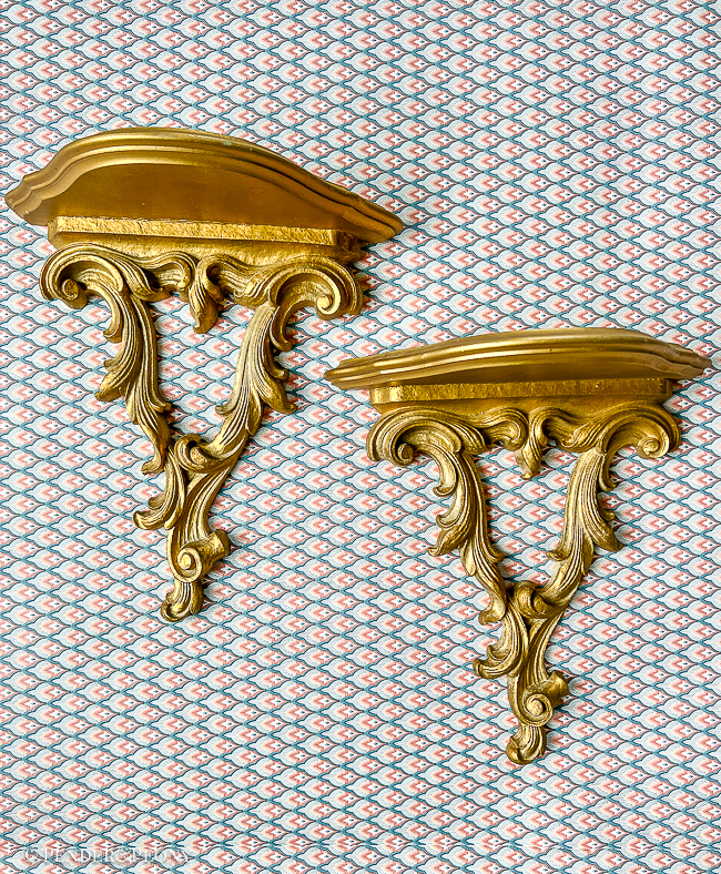 Gorgeous gold wall shelves to display a treasured trinket or two.