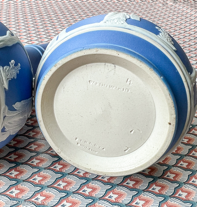 Classic blue and white Wedgwood Jasperware bottles with lids.