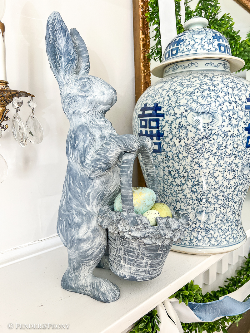 Blue bunny with floral basket - made from resin - decorating Easter mantel