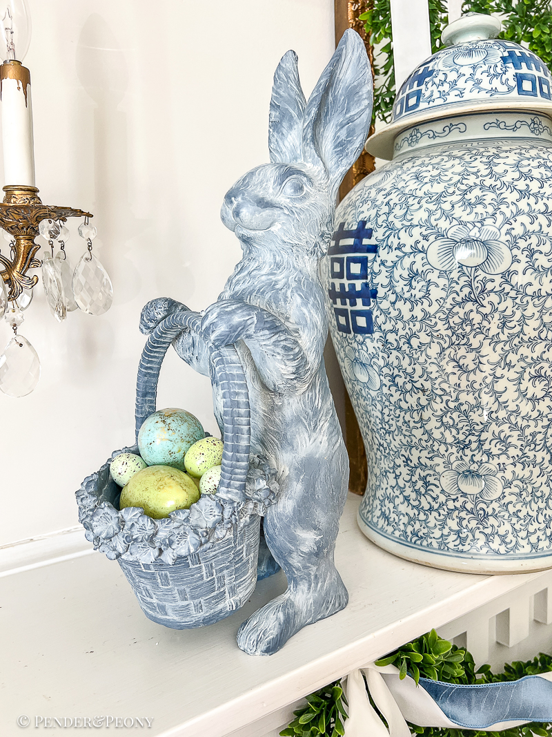Blue bunny with floral basket - made from resin - decorating Easter mantel