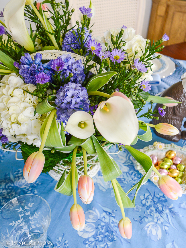 Detail view of calla lillies and hyacinths in Easter table centerpiece