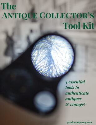 The antique collector's tool kit - magnifying loupe over engraving