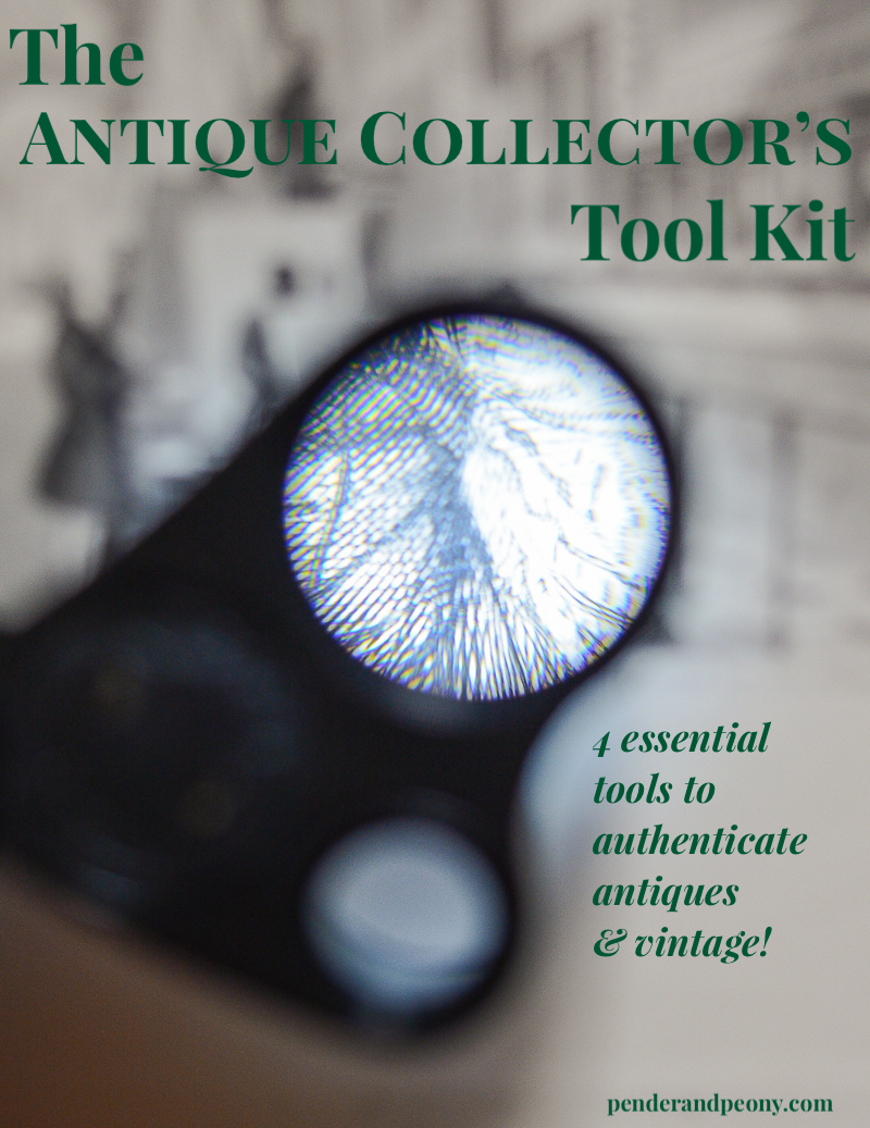 The antique collector's tool kit - magnifying loupe over engraving