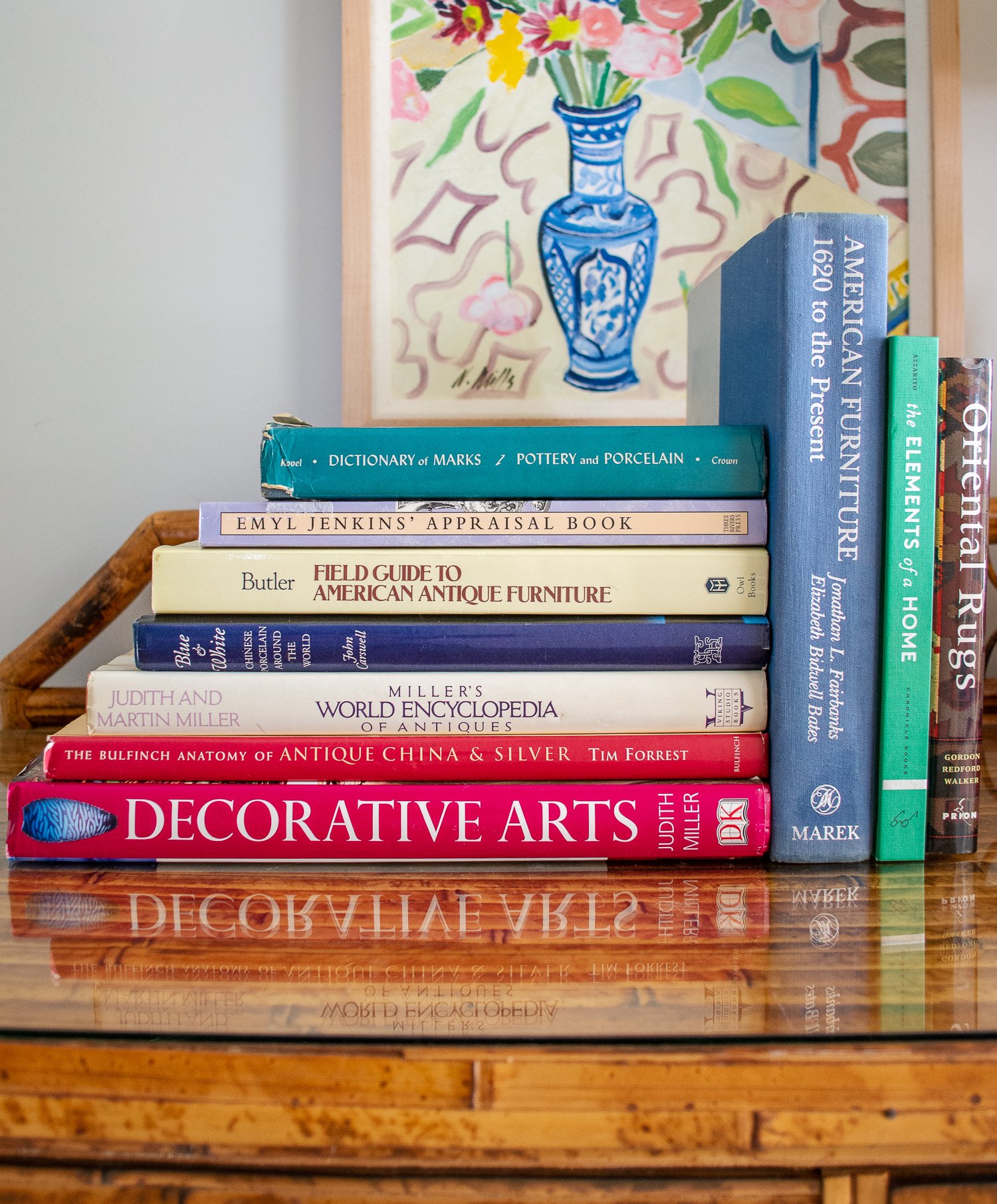 Stacks of resource books for collecting antiques