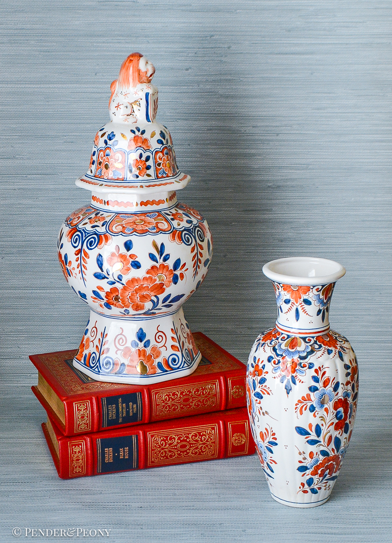 Vibrant cobalt blue and orange floral Delft: lion final jar and vase.