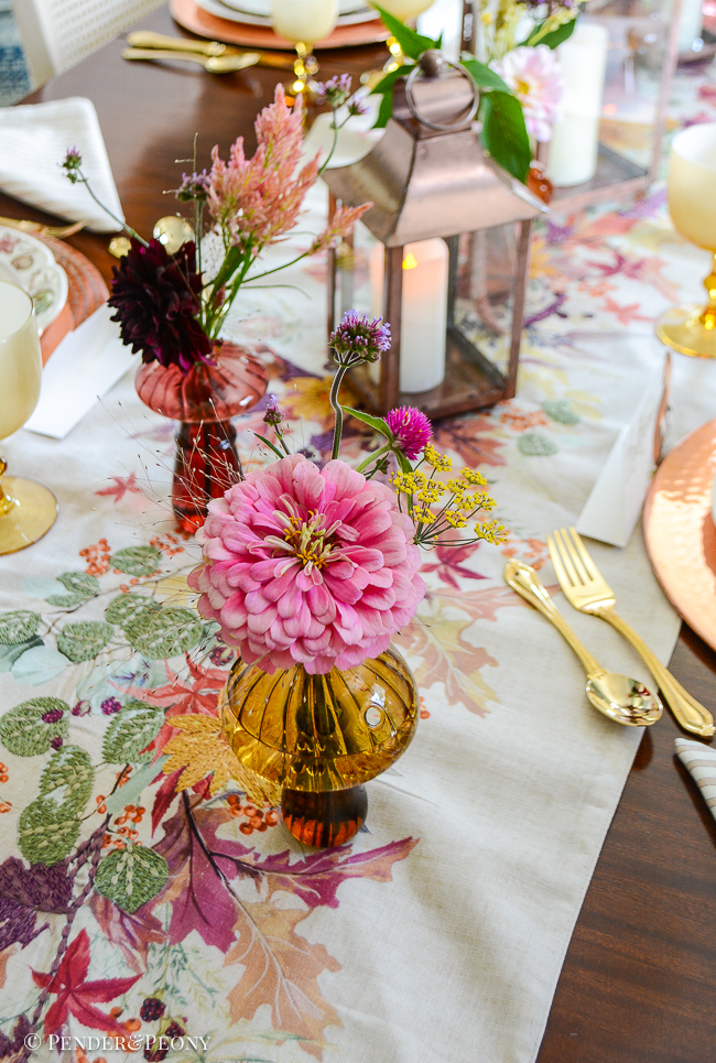 Charming glass mushroom bud vases hold pretty farmer's market flowers