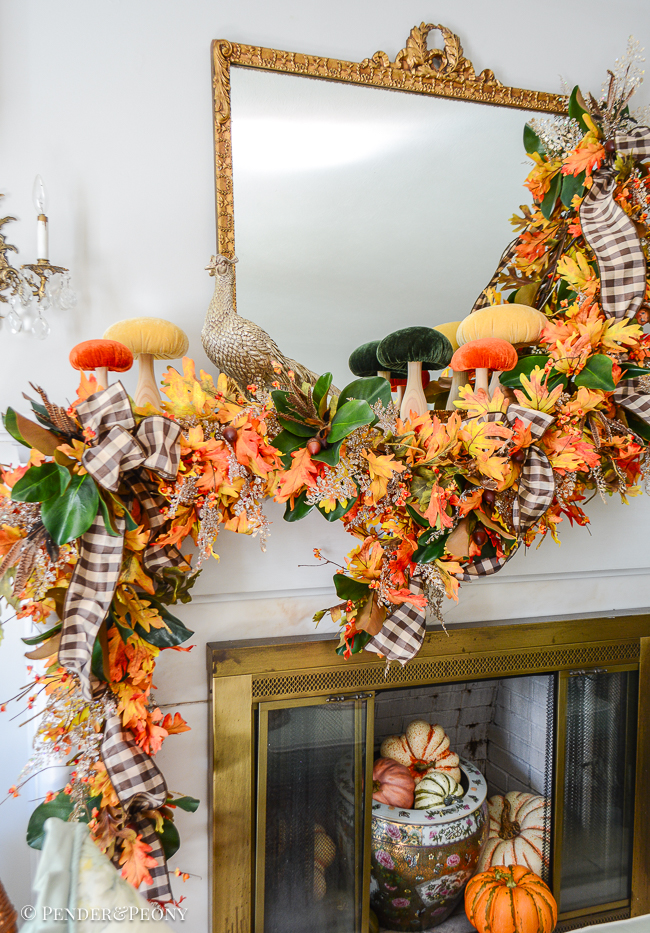 Here is the oak leaf and acorn garland used on my fall mantel and mixed with bittersweet, fern, mangolia, and ribbon