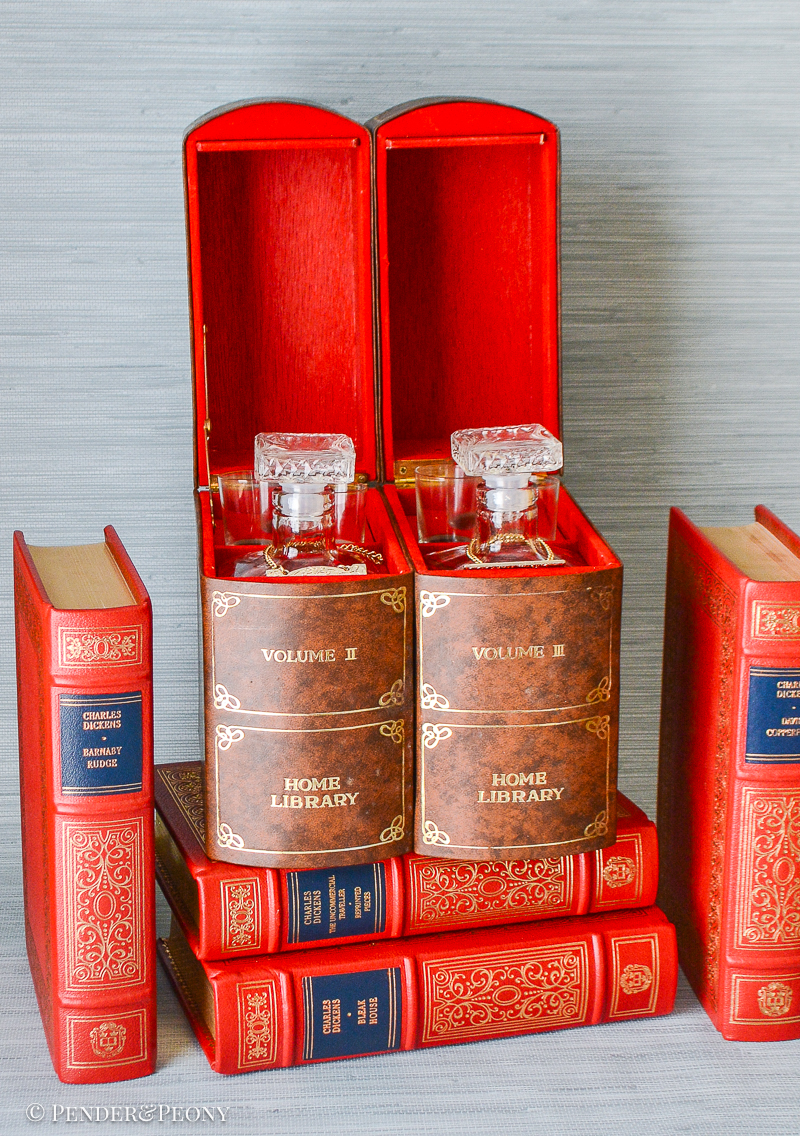 Add a chic little hideaway bar to your bookshelves or table with this faux book tantalus.