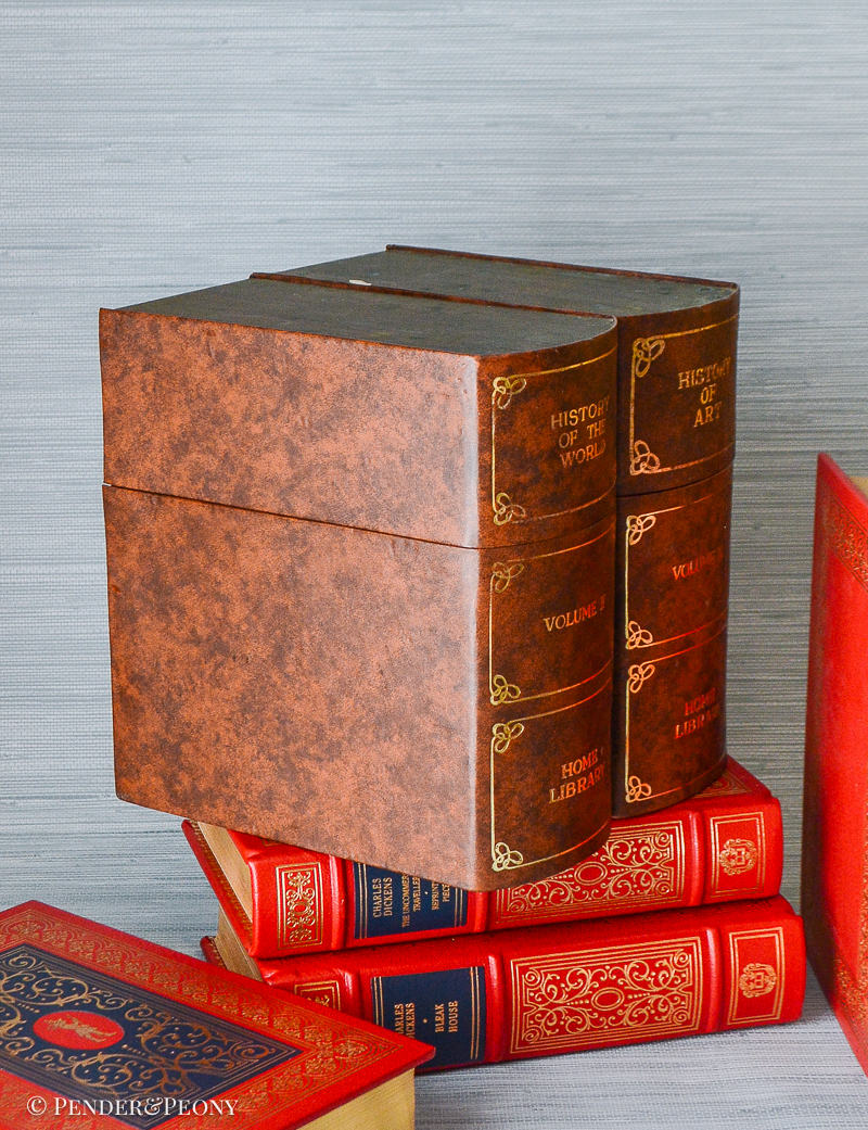 Add a chic little hideaway bar to your bookshelves or table with this faux book tantalus.