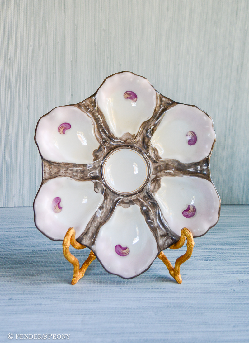 Brown and pink oyster shell plate with impressed mark 765, typical French Limoges mark. Late 19th century.