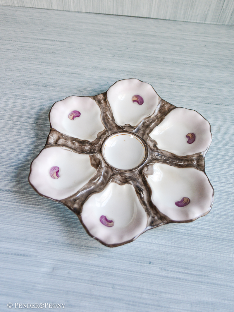 Brown and pink oyster shell plate with impressed mark 765, typical French Limoges mark. Late 19th century.