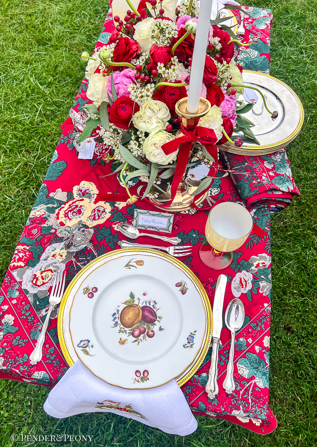 Beautiful Christmas table with red chintz tablecloth, Royal Worcester Delecta bone china, silver, Murano glass, and peonies