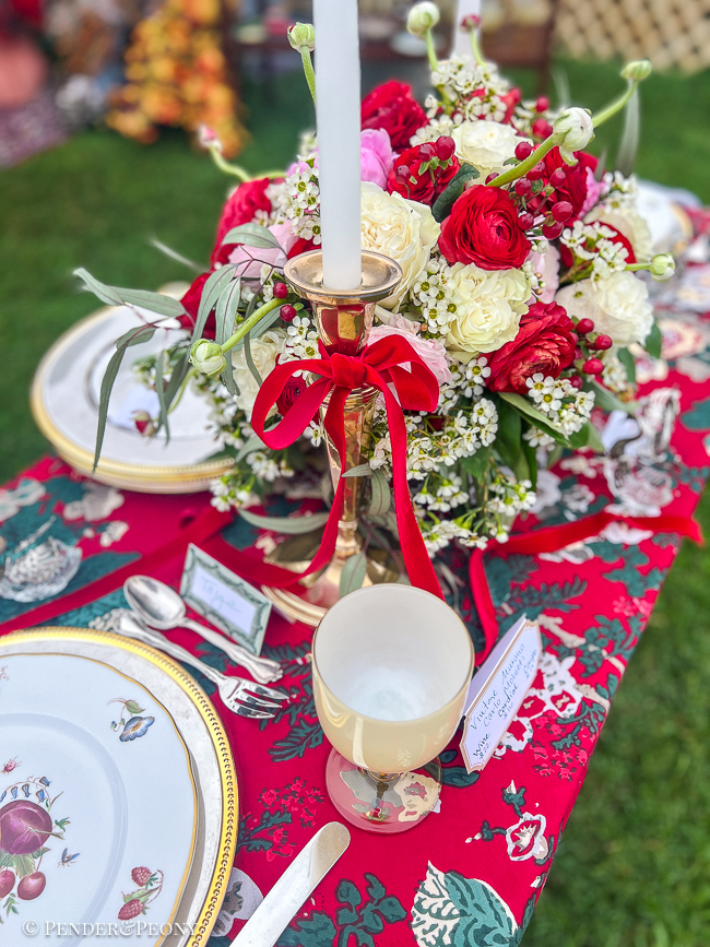 Detail of Christmas centerpiece with brass candlesticks
