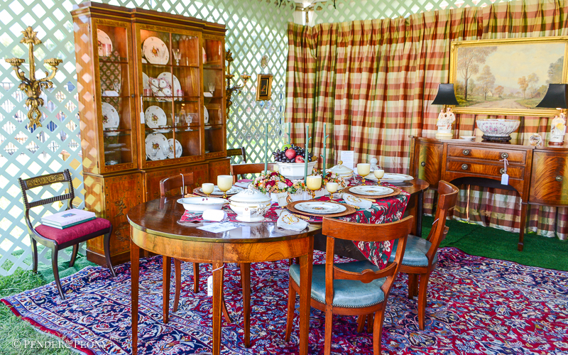 15 x 15 tent decorated as a dining room with Grandmillennial style and lots of antiques