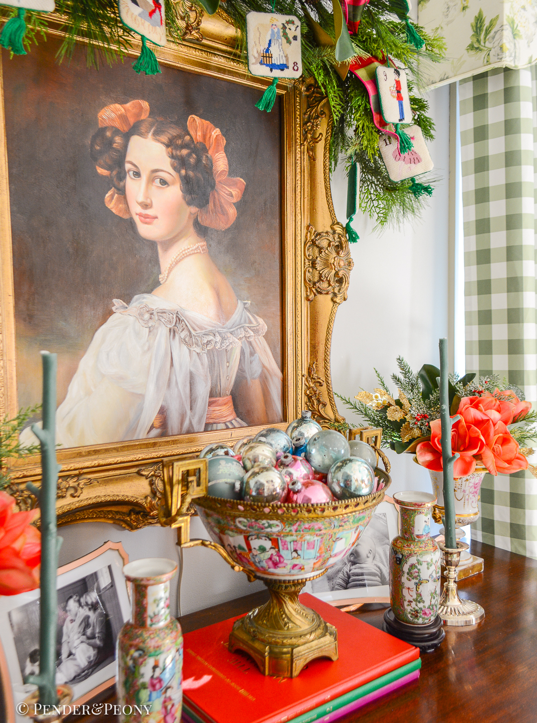 Sideboard with portrait decorated for Christmas