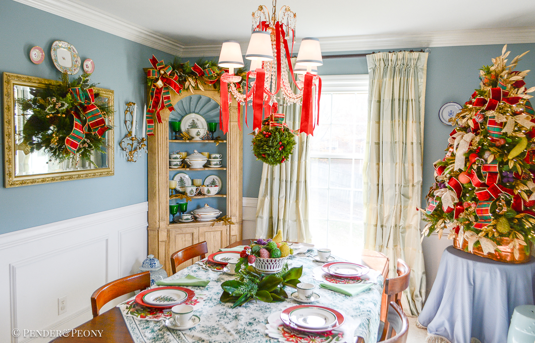 When Spode's Christmas tree dishes, classic plaid ribbon, and vintage beaded fruit meet in the dining room for a merry holiday look!