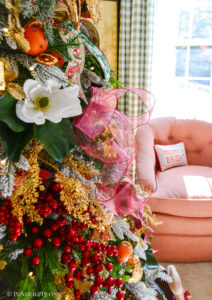 A look at my Grand Botanical Christmas tree decorated with magnolia, florals, embroidered bows, gingham ribbons, pink and green, and orange pomanders
