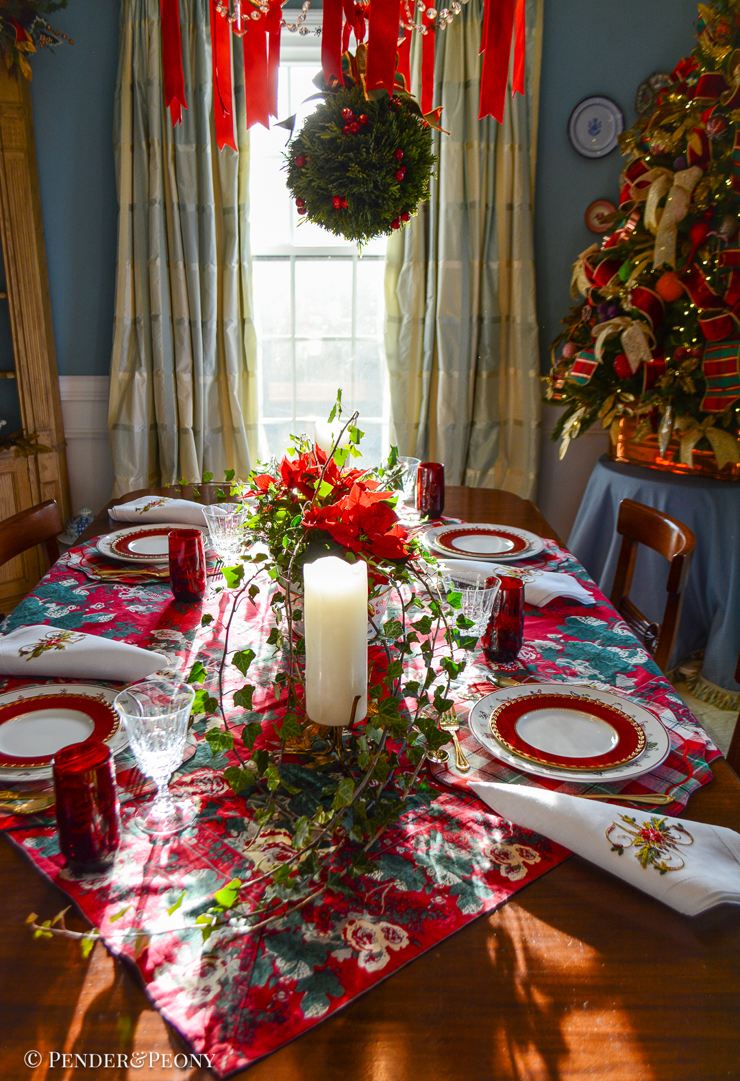 Making Christmas magic with classic Christmas table decor - setting the table in elegant red, green, and white with chintz, Johnson Bros, plaid, and Royal Worcester