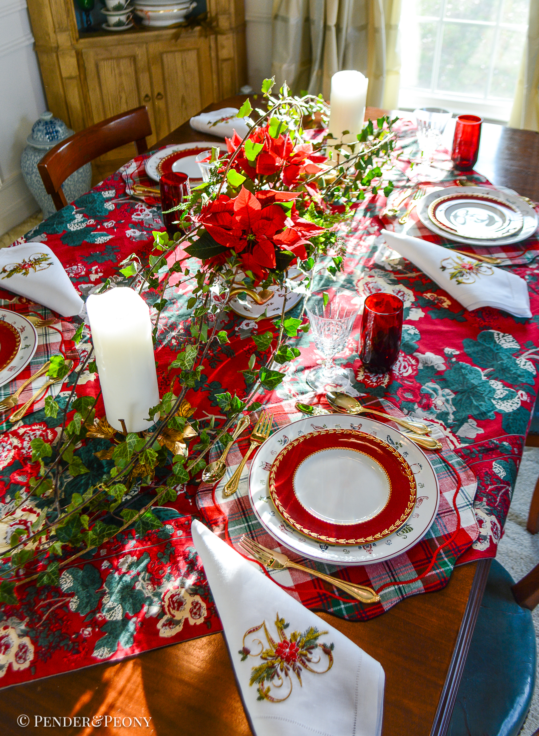 Making Christmas magic with classic Christmas table decor - setting the table in elegant red, green, and white with chintz, Johnson Bros, plaid, and Royal Worcester