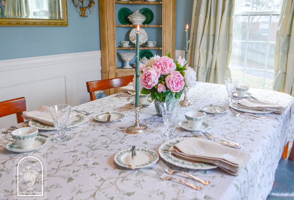 Elegant spring table decor with Wedgwood Queen's Ware, peonies, silver, and floral linens