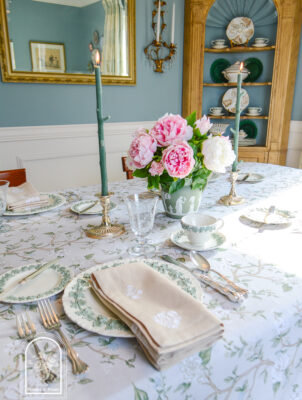Elegant spring table decor with Wedgwood Queen's Ware, peonies, silver, and floral linens