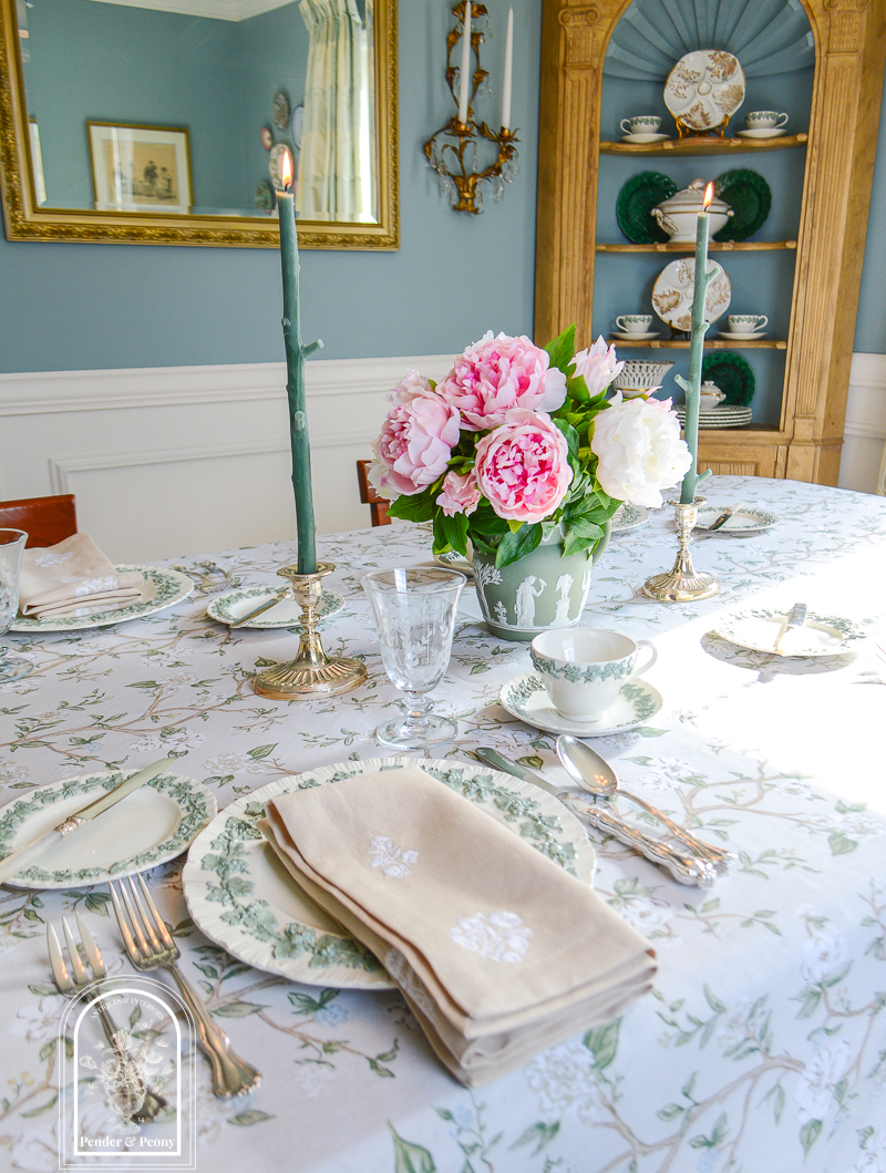 Elegant spring table decor with Wedgwood Queen's Ware, peonies, silver, and floral linens