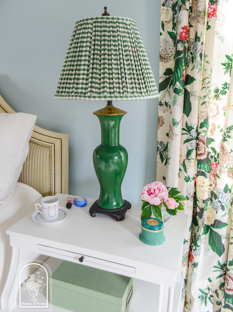 master bedroom upgrades with white nightstands and green Chinese lamps